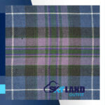 Pride of Scotland tartan homespun fabric for sale showing blue-based pattern with Saltire white green hills purple heather colors, authentic Scottish wool textile by the yard