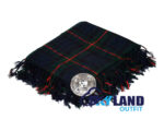 Gunn tartan kilt fly plaid with free Celtic brooch, bold red and green Highland pattern representing ancient Norse-Scottish clan heritage
